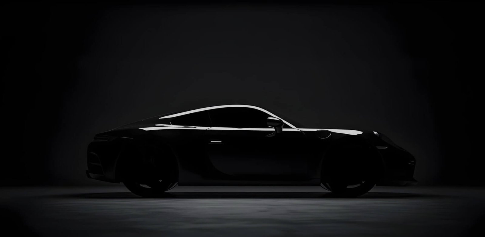 Glossy black performance car under premium studio lighting